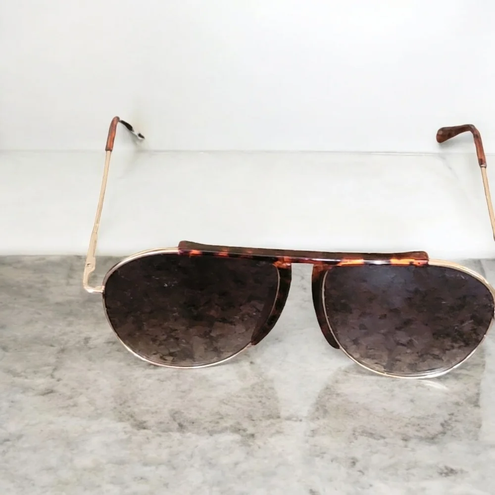 Brown and gold aviator sunglasses